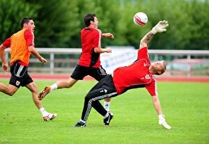 Images Dated 19th July 2010: Dean Gerken Saves from Ivan Sproule: A Training Moment at Bristol City