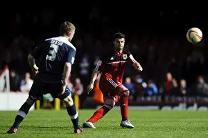 Decisive Moment: Foster's Pass Ignites Intense Npower Championship Clash between Bristol City and Huddersfield Town, April 2013