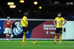 Dejected Adebayo Azeez and George Francomb of AFC Wimbledon after Loss to Bristol City