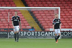 Sheffield United V Bristol City Prints: Dejected Duo: Aden Flint and Wade Elliott after Bristol City's 3-0 Defeat at Bramall Lane