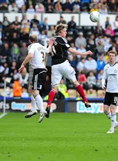 Derby County V Bristol City Prints: Derby County vs. Bristol City: Intense Battle for the Championship Ball - Martyn Woolford vs