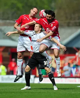 Derby County's Tomasz Cywka Clashes with Bristol City's Paul Hartley and Louis Carey for Aerial Ball in Championship Match, 24/04/2010