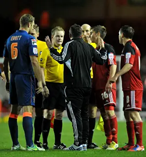 Black Pool Prints: Derek McInnes Faces Referee Gavin Ward after Bristol City's Championship Clash vs Blackpool