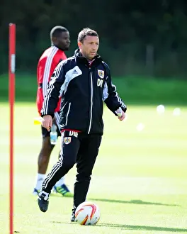Bristol Citys George Elokobi Prints: Derek McInnes Leads Bristol City Football Training Session, September 2012