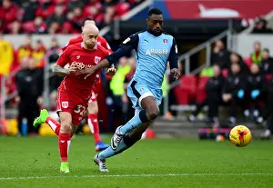 Bristol City V Rotherham United Prints: Determined Clash: David Cotterill vs Semi Ajayi for Possession - Bristol City vs Rotherham United