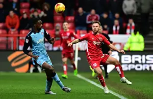Framed Print : Determined Clash: Matty Taylor vs Semi Ajayi at Ashton Gate Framed Print : Determined Clash: Matty Taylor vs Semi Ajayi at Ashton Gate