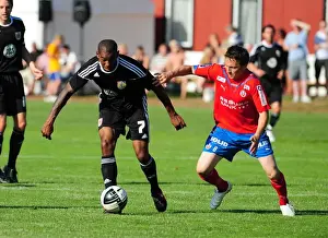 Determined Marvin Elliott's Battle for the Ball: Helsingborgs IF vs. Bristol City