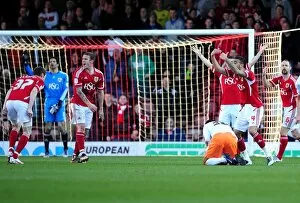 Images Dated 25th February 2012: Disbelief: Free Kick Surprise for Bristol City Players against Blackpool (25-02-2012)