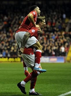 Images Dated 21st October 2014: Double Trouble: Aden Flint and Derrick Williams Unstoppable Goal Celebration (Bristol City vs)