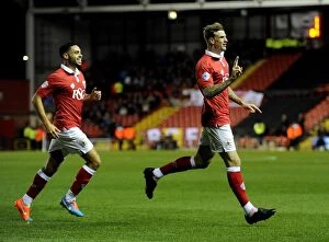 Images Dated 21st October 2014: Double Trouble: Unstoppable Celebration of Aden Flint and Derrick Williams Brace, Bristol City vs