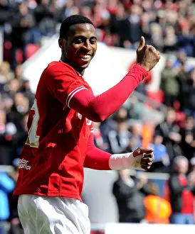 Bristol City V Huddersfield Town Prints: Euphoria Unleashed: Jonathan Kodjia's Thrilling Goal Celebration for Bristol City vs