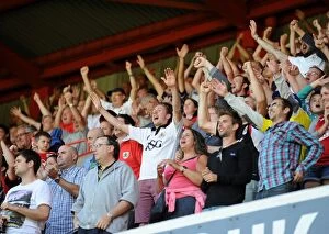Images Dated 9th August 2014: Euphoric First Win: Bristol City Fans Celebrate at Bramal Lane after Sky Bet League One Victory