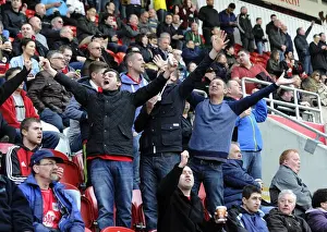 Exultant Moment: Thrilling Goal Celebration by Bristol City Fans at Rotherham United Match, March 2014