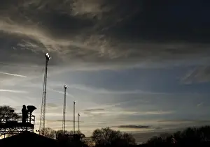 Framed Print : FA Cup Sunset: ITV Cameraman and Floodlights at Tamworth's The Lamb Ground Framed Print : FA Cup Sunset: ITV Cameraman and Floodlights at Tamworth's The Lamb Ground