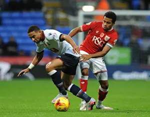 Bolton Wanderers V Bristol City Prints: Feeney vs. Smith: Intense Battle for Possession in Bolton Wanderers vs