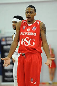 Images Dated 11th October 2014: Fierce Showdown: Flyers vs. Raiders in the British Basketball Cup at Wise Campus