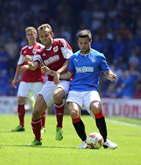 Images Dated 13th July 2013: A Fight for Supremacy: Liam Kelly vs. Richard Foster - Bristol City vs. Glasgow Rangers