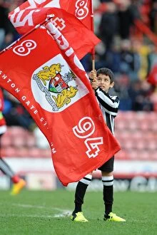 Images Dated 15th February 2014: Flag Bearer at Ashton Gate: Bristol City vs Tranmere Rovers, Sky Bet League One Football Match
