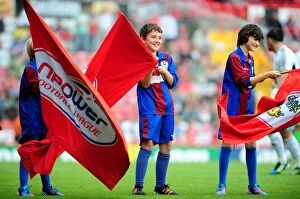 Images Dated 25th August 2012: Flag Bearers at Ashton Gate: Bristol City vs. Cardiff City Championship Match, 2012