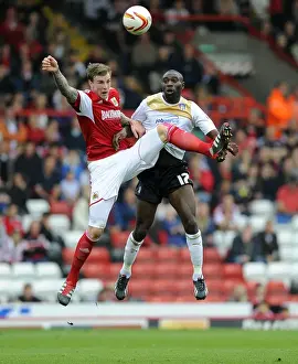 Bristol City V Colchester United Prints: A Football Rivalry: Aden Flint vs Jabo Ibehre Clash at Ashton Gate, September 2013