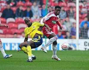 Images Dated 24th March 2012: Football Rivalry: Cisse vs. Ogbeche at Riverside Stadium (2012) - Bristol City's Kalifa Cisse