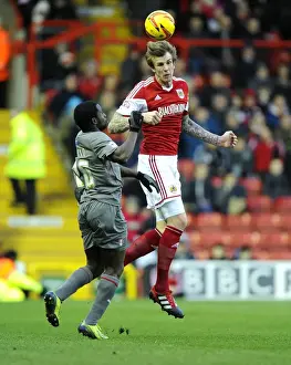 Bristol City V Rotherham United Prints: Football Rivalry in Sky Bet League One: Aden Flint vs Nouha Dicko's Aerial Battle