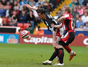 Framed Print : Football Rivalry: Thrilling Moment between Michael McIndoe (Sheffield United vs. Bristol City)