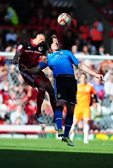 A Football Rivalry Unfolds: Wilson vs Becchio - Battle for the High Ball (Bristol City vs Leeds United)
