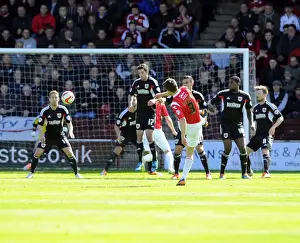 Football Rivalry: Wagstaff Blocks Taylor's Free Kick