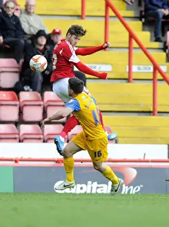 Football Rivalry: Wes Burns vs David Buchanan Amidst Allegations - Sky Bet League One, Bristol City vs Preston North End: Battle for the High Ball Amidst Spot-Fixing Investigation