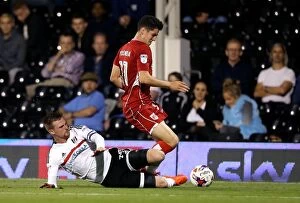 Images Dated 21st September 2016: Fulham vs. Bristol City: Clash between Tunnicliffe and O'Dowda at Craven Cottage - EFL Cup