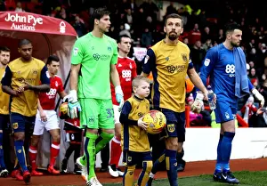 Gary O'Neil and Young Mascot Lead Bristol City Out at The City Ground