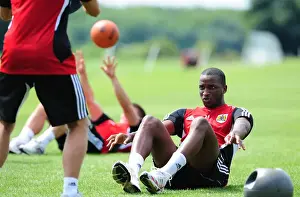 Pre-season Training Prints: Gearing Up: Kalifa Cisse's Intense Pre-Season Training with Bristol City
