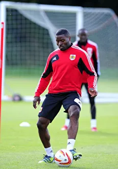 Bristol Citys George Elokobi Prints: George Elokobi Trains with Bristol City Ahead of Loan Move
