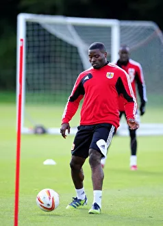 Bristol Citys George Elokobi Prints: George Elokobi Trains with Bristol City Ahead of Loan Move