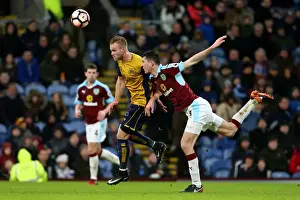 Burnley Prints: Gustav Engvall vs Michael Keane: Clash at Turf Moor in FA Cup Fourth Round