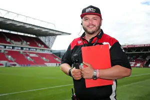 Framed Print : Half Time at Ashton Gate: Stadium Announcer Ian Downs Pauses Amidst Bristol City vs. Portsmouth Pre-Season Action Framed Print : Half Time at Ashton Gate: Stadium Announcer Ian Downs Pauses Amidst Bristol City vs. Portsmouth Pre-Season Action