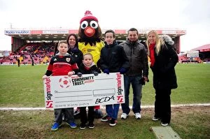 Images Dated 23rd February 2013: Half-time Cheque Presentation at Ashton Gate: Bristol City vs Barnsley, 23/02/2013
