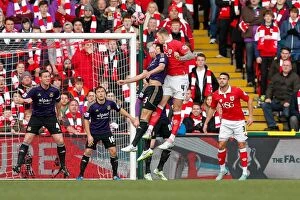 Images Dated 25th January 2015: Head-to-Head: Aden Flint vs. James Tomkins in the FA Cup Fourth Round Clash between Bristol City