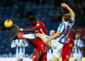 Huddersfield Town V Bristol City Prints: Huddersfield's Hefele Holds Off Abraham in Championship Showdown