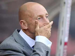 Round 2 Prints: Ian Holloway of Crystal Palace Covers Mouth in Surprise at Bristol City's Upset Win