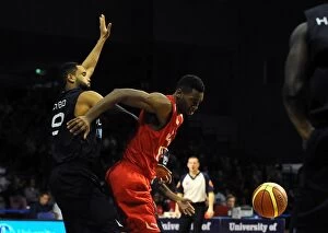 Images Dated 31st October 2014: Intense Action: Alif Bland of Bristol Flyers vs. Wolves Defense during British Basketball League
