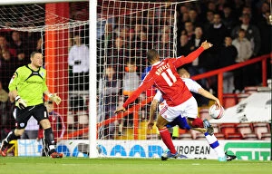 Images Dated 22nd October 2010: Intense Action from the Npower Championship Showdown: Bristol City vs QPR (October 2010)