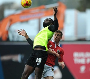 Bristol City V Oldham Athletic Prints: Intense Aerial Battle: Bryan vs. Ibehre - Sky Bet League One Clash at Ashton Gate