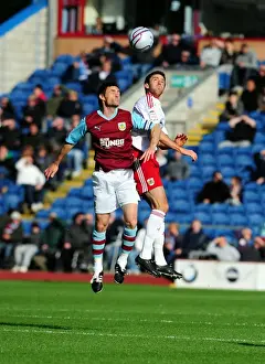 Burnley V Bristol City Prints: Intense Aerial Battle: Cole Skuse vs Graham Alexander