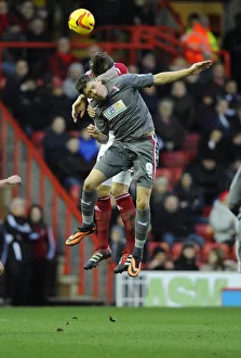Bristol City V Rotherham United Prints: Intense Aerial Battle: Flint vs