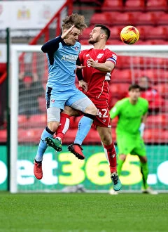 Images Dated 4th February 2017: Intense Aerial Clash: Bailey Wright vs. Danny Ward