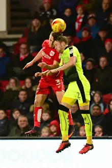 Bristol City V Reading Prints: Intense Aerial Clash: Joe Bryan vs Chris Gunter at Ashton Gate