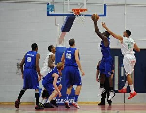 Images Dated 27th September 2014: Intense Basketball Defence: Flyers vs. Raiders - SGS Wise Campus, British Basketball League