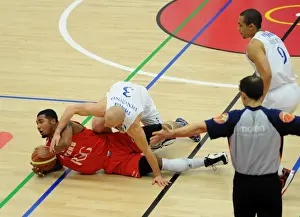 Intense Basketball Showdown: Dwayne Lautier-Ogunleye vs. Cheshire Phoenix Opponent